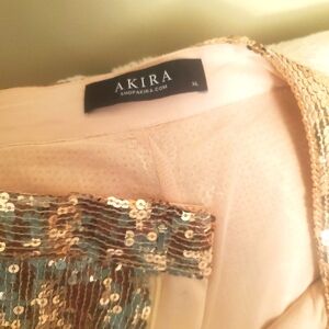 AKIRA! Gold sequince pants.